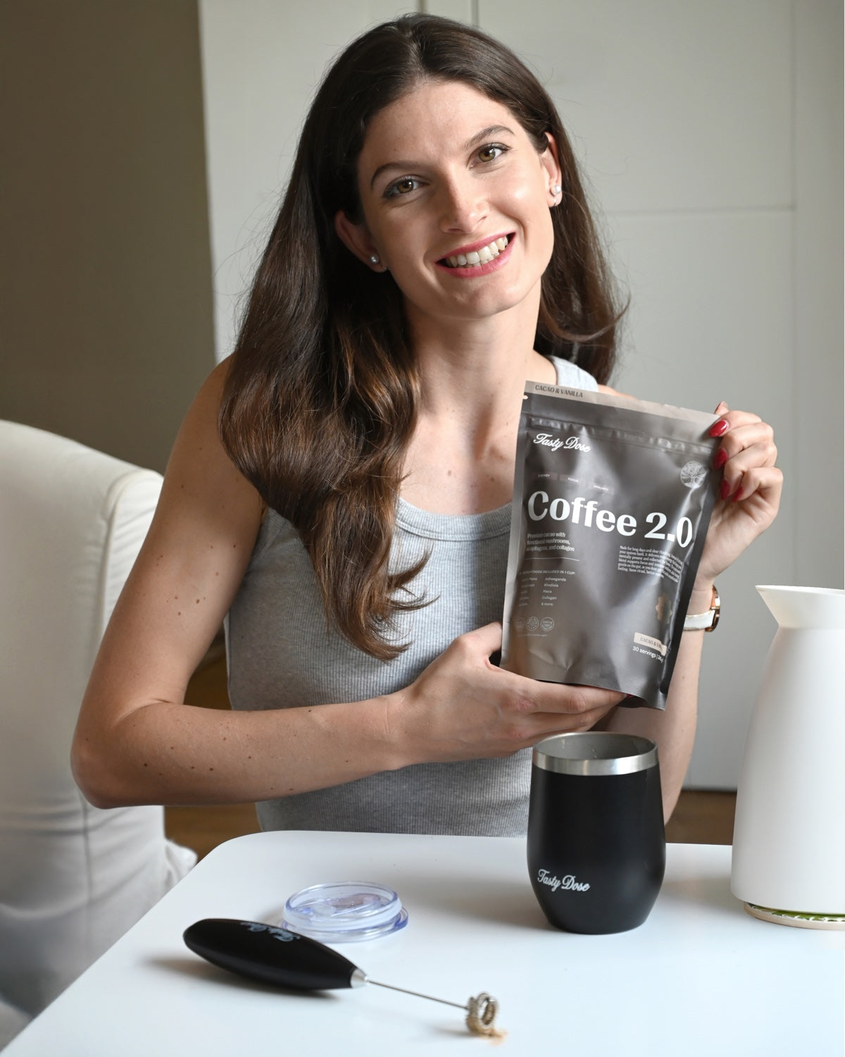 Real customer at her table making her morning Coffee 2.0 with the kit